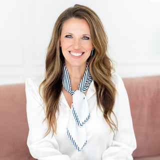 Navy and White French Silk Scarf on woman on pink couch